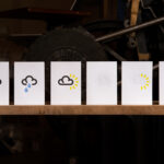 Hand printed cards with weather forecast symbols